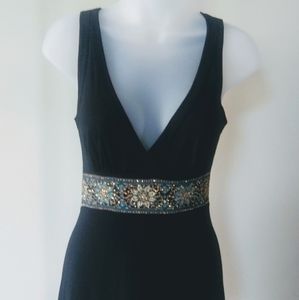 Black Plunging V-Neck Top with Embellished Waist